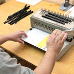 Black Atlas A4 binding comb spine with 18mm spine width, designed for secure binding and easy page addition.
