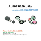 Black rubberized round USB flash drive by AMS, showing close-up of USB connector and smooth black casing.
