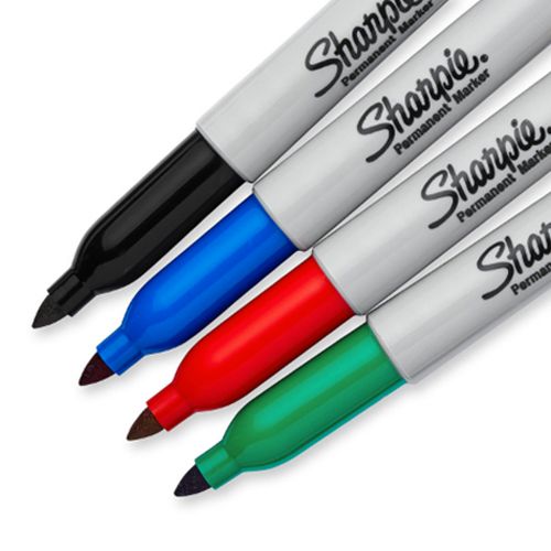 Set of four Sharpie Fine Tip Permanent Markers in assorted colors, ideal for writing and labeling on various surfaces.
