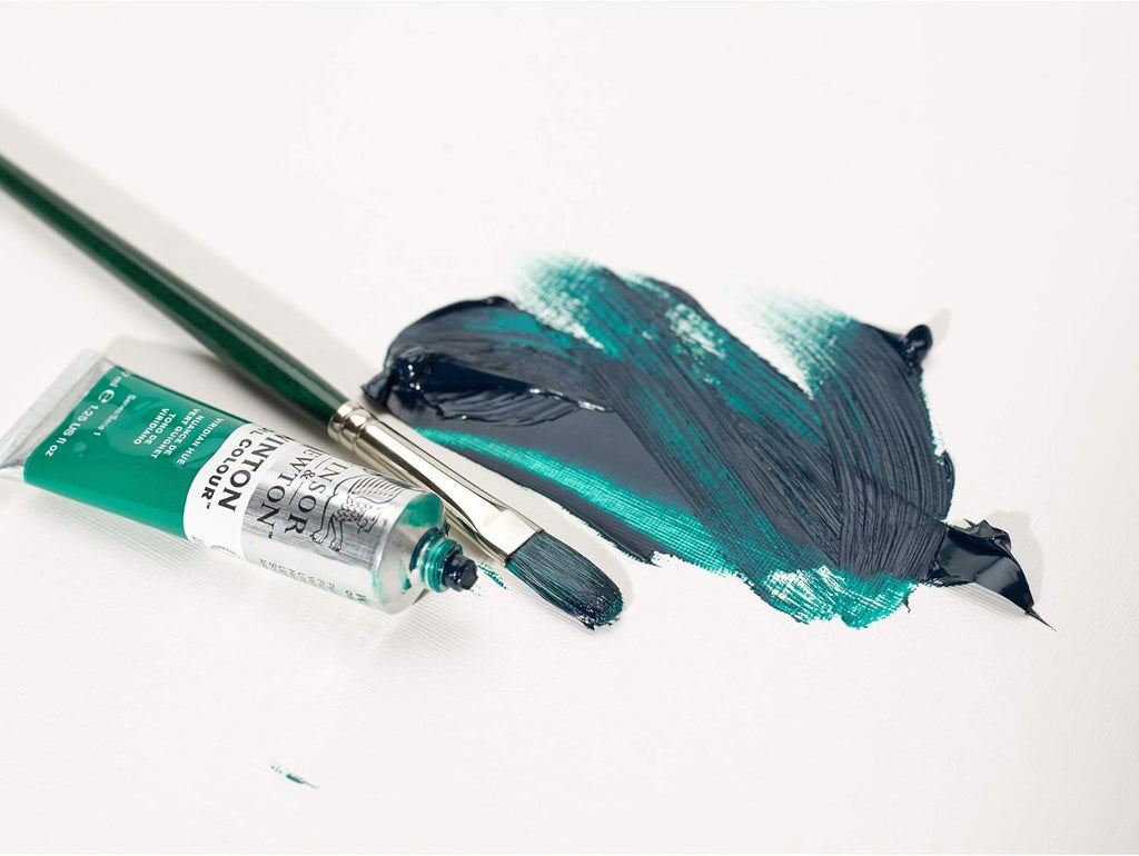 Winsor & Newton Winton Brush Set of 3, featuring assorted sizes of artist paint brushes on a neutral background.