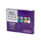 Winsor & Newton Artisan water mixable oil colour starter set with six 21ml tubes in various colors arranged neatly.